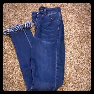 Jeans with fraded bottoms